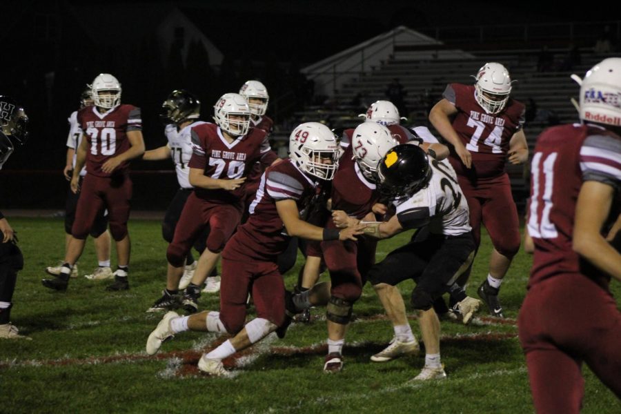 Riley Tobias and Trey Reynolds are protecting Josh Leininger from getting sacked.