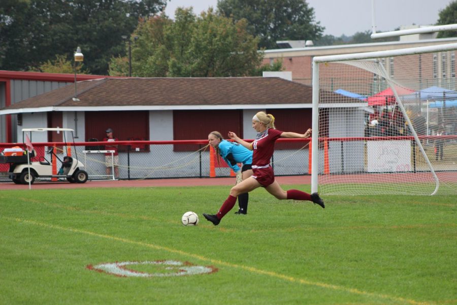 Gabi Miller taking a goal kick.
