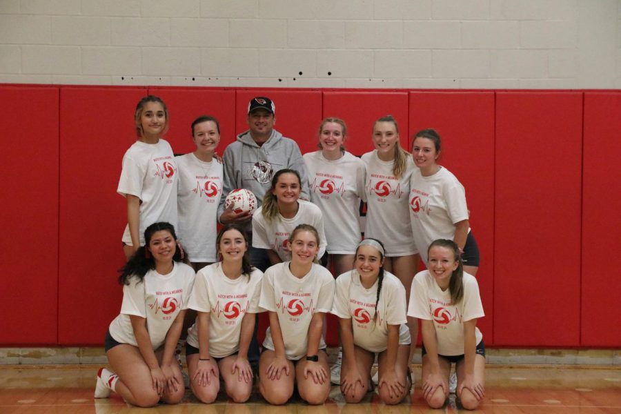 Lady Cards pose with Christian Frey before the match.