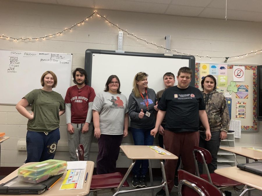 When a picture was mentioned, all the kids ran to get in it. Its rewarding to see the kids grow, said Mrs. Imler. From left to right: Breanna Funk, junior; George Bixler, freshman; Alexis Kitchens, senior; Mrs. Imler; Owen Langkam, freshman; Clayton Norton, senior; and Michael Bixler, freshman.