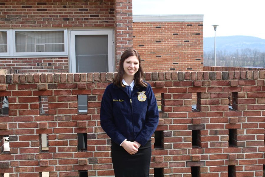 Alexis Butler, freshman, placed 6th place at the 2022 FFA Area Public Speaking Contest. After the contest, she posed for a picture in her FFA Jacket.