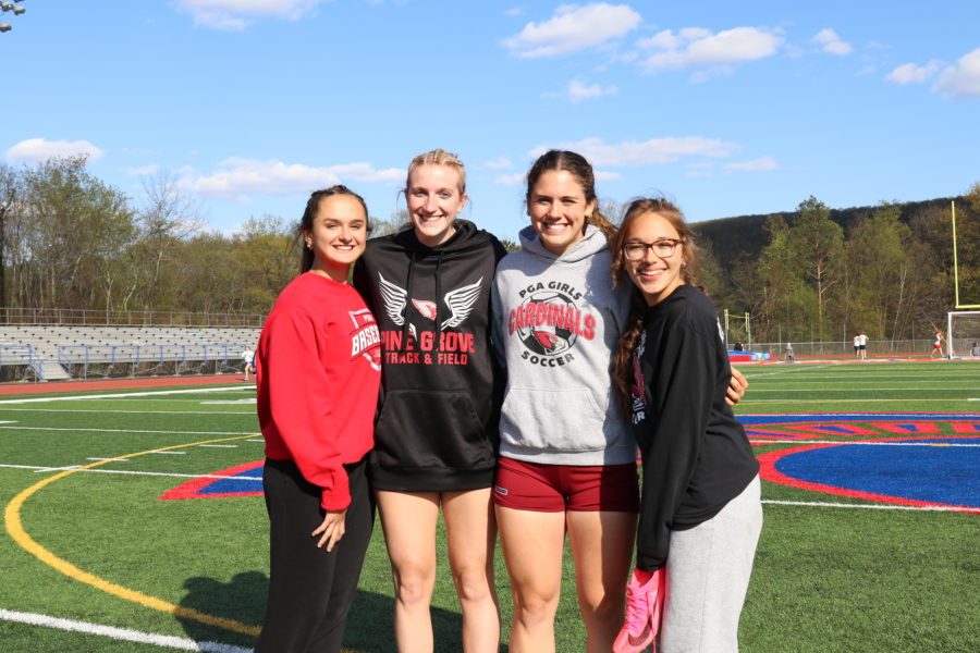From left to right: Tanae Frey, senior; Kailen Felty, senior; Mia Jefferson, senior; and Viktoria Luckenbach, sophomore. The four girls hold the school record for the 4x400 meter relay with a time of 49.88 seconds.