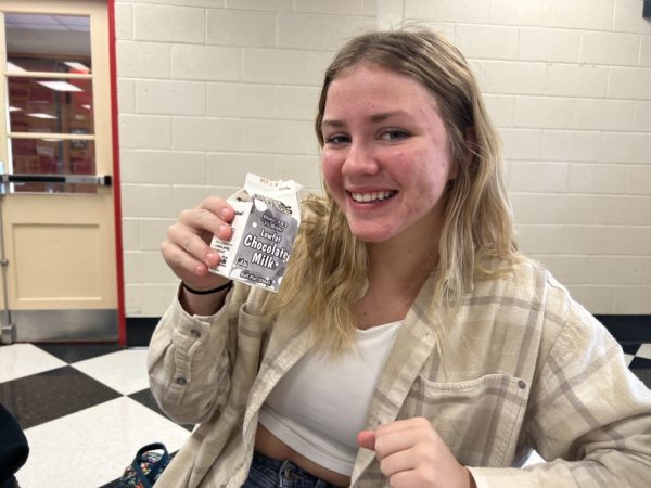 Allison Kelley, junior, enjoying real chocolate milk at lunch.