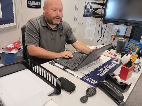 A picture of Mr. Salen, the head coach of Pine Groves quiz bowl program, hard at work. Through the direction of Mr. Salen, this years quiz bowl team hopes to accomplish their goals and maximize their potential as players.